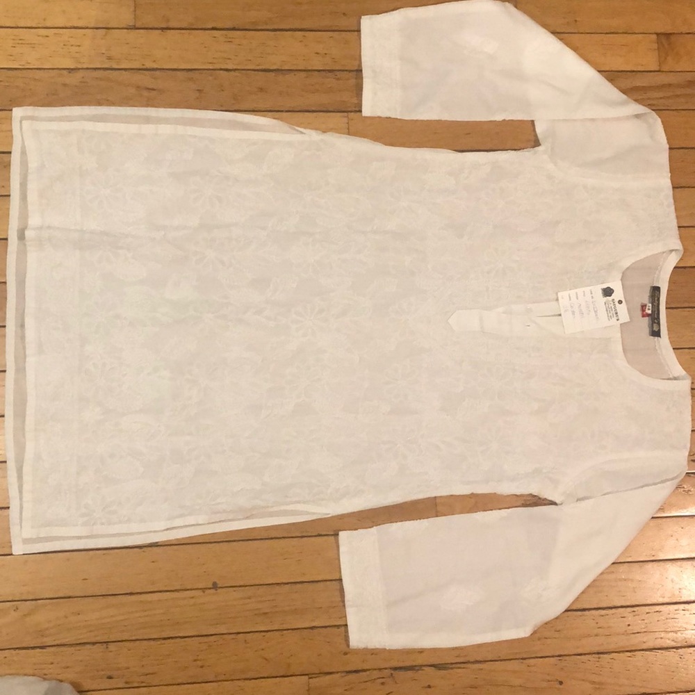 Embroidered white tunic